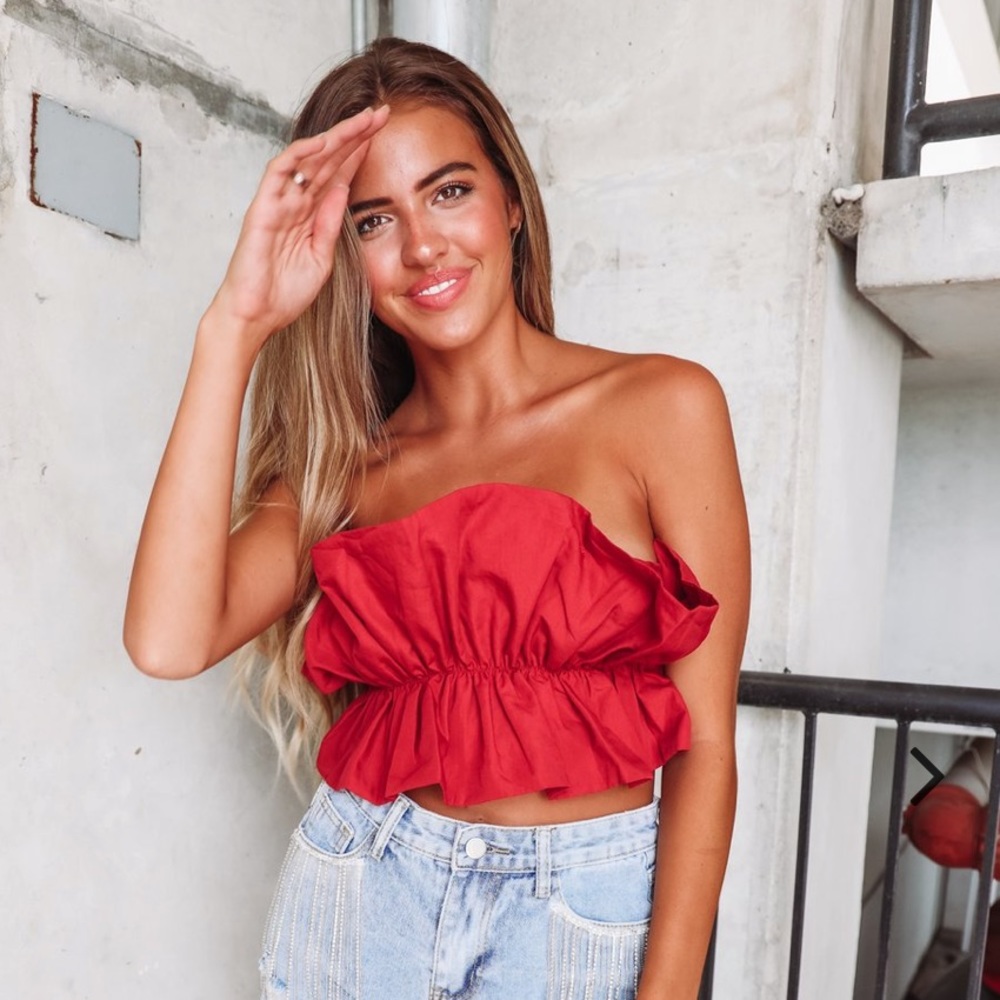 Brand new boutique ruffle top